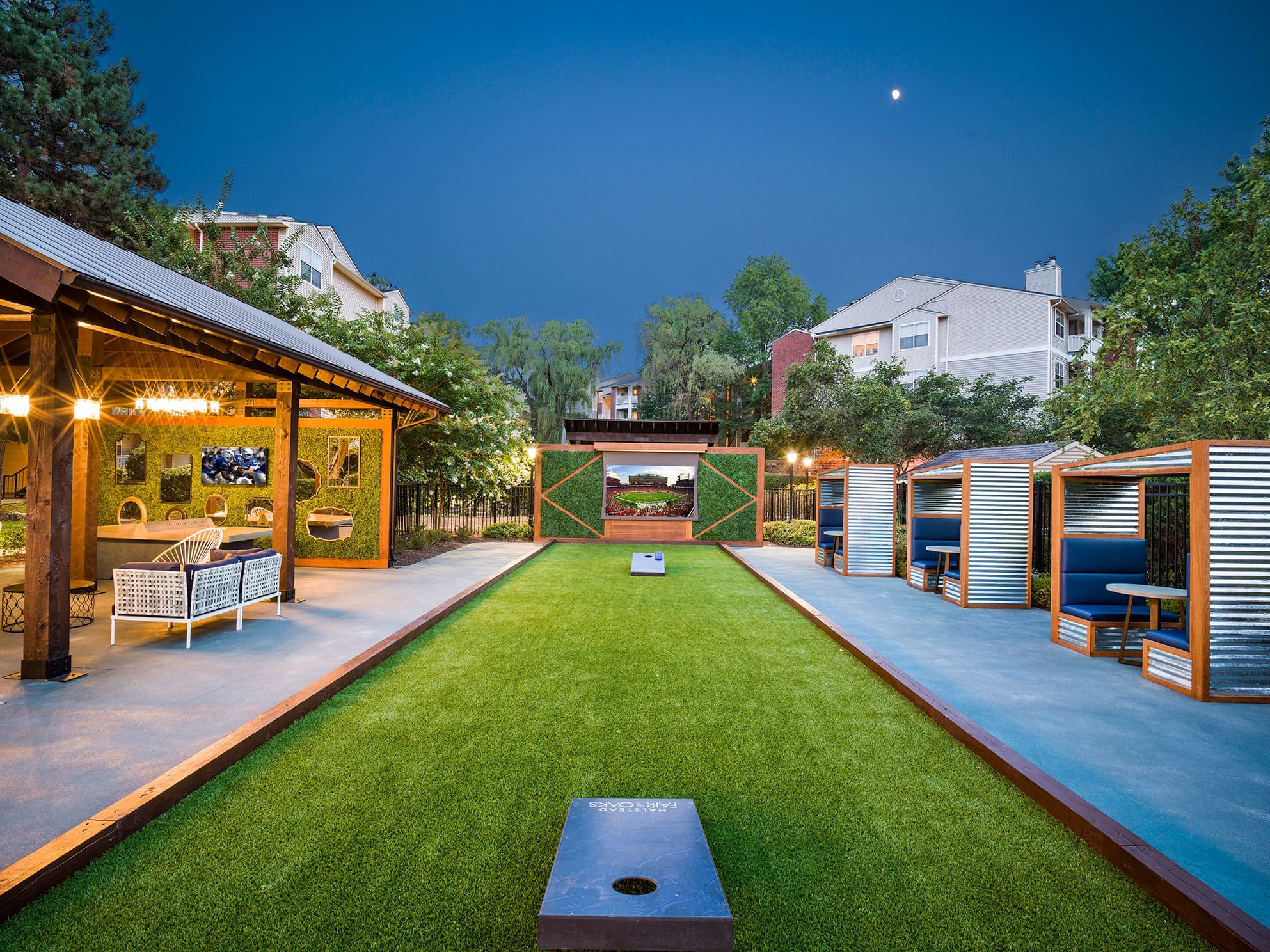 Garden, pool, and seating area at Halstead Fair Oaks